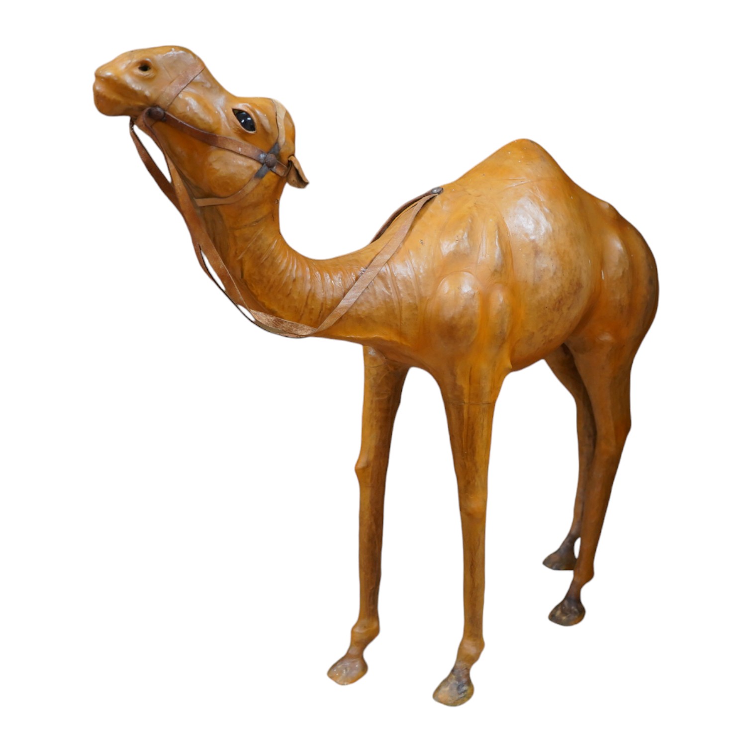 A Liberty style finely modelled brown leather Camel in the manner of Omersa, 49cm high. Condition - good